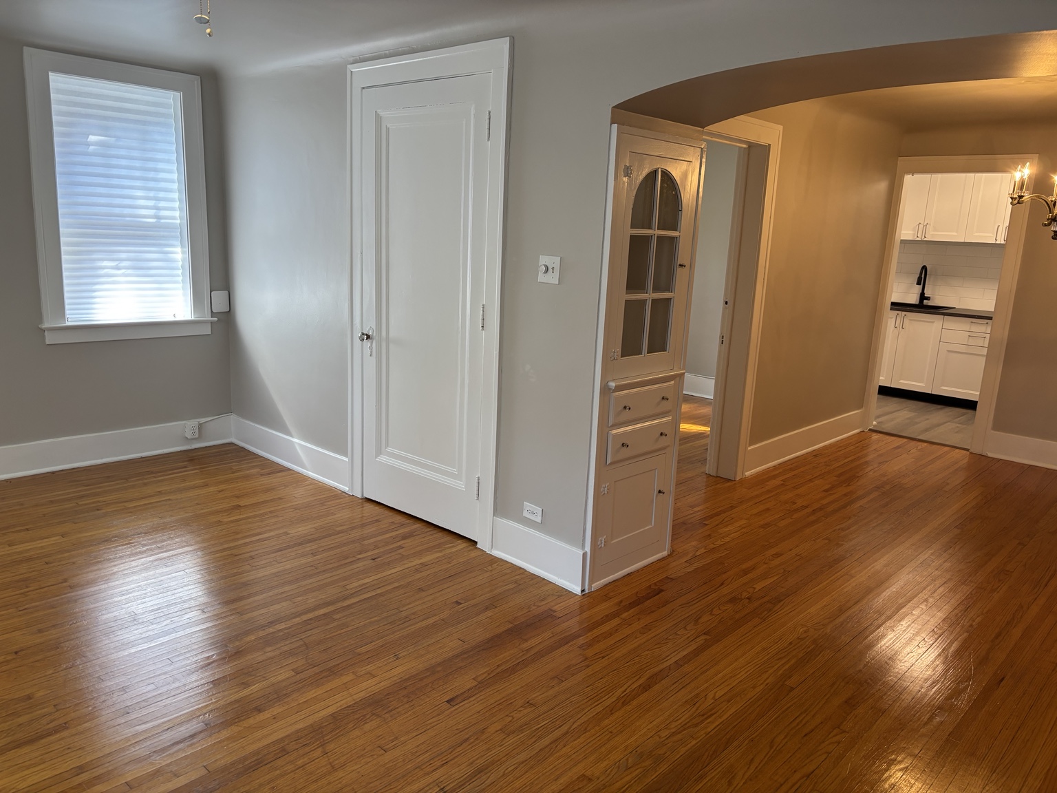 Living room hardwood floor and built-in display cabinet — 430 Giles Blvd W., Windsor, Ontario