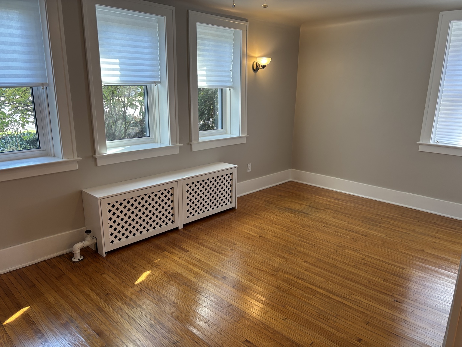 Living room windows and hardwood floor — 430 Giles Blvd W., Windsor, Ontario